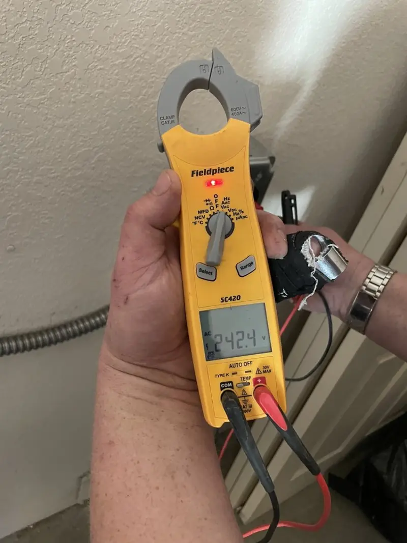 Voltage testing with clamp meter during Hot Tub / Pool Electrical Wiring in Holdrege